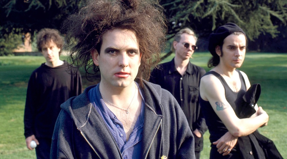 The Cure, Саймон Гэллап – справа, со скрещенными руками